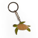 Turtle-shaped keychain on a white background