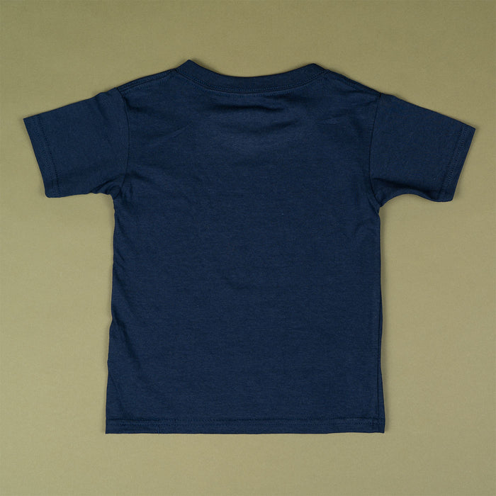 A navy blue short-sleeve t-shirt shown from the back, laid flat on a solid olive green background.