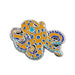 Colorful octopus-shaped pin on a white background