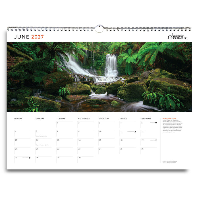 A single-page wall calendar spread from Australian Geographic showing June 2027. The top half features a large scenic photograph of a waterfall in a lush green forest, with the Australian Geographic logo in the upper right.