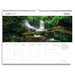 A single-page wall calendar spread from Australian Geographic showing June 2027. The top half features a large scenic photograph of a waterfall in a lush green forest, with the Australian Geographic logo in the upper right.