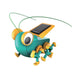 Toy grasshopper with solar panel on a white background