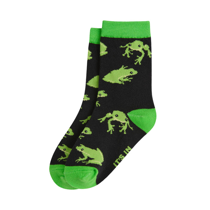 A pair of black crew socks with a green pixelated frog pattern, bright green toes, heels, and cuffs, and the partial text 'IT'S IN' printed on the side.