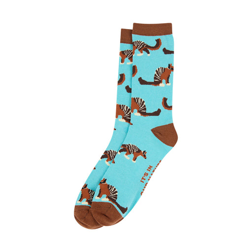 Socks with Numbat pattern on a light blue background