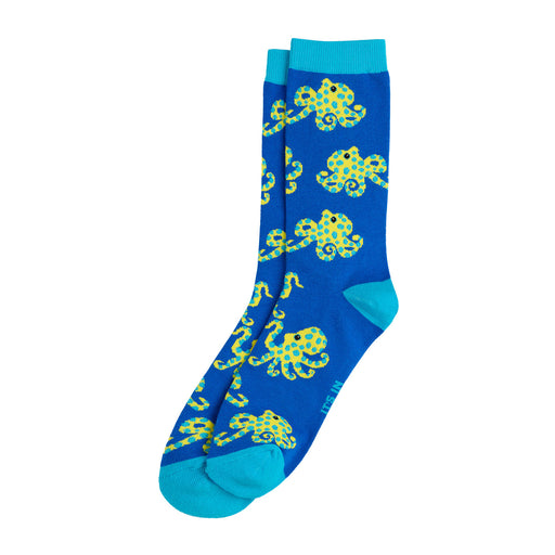 A pair of blue crew socks with a repeating pattern of yellow and green octopus-like sea creatures, featuring bright turquoise cuffs, heels, and toes, shown on a plain white background.