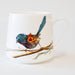 Mug with a colorful bird design on a white background